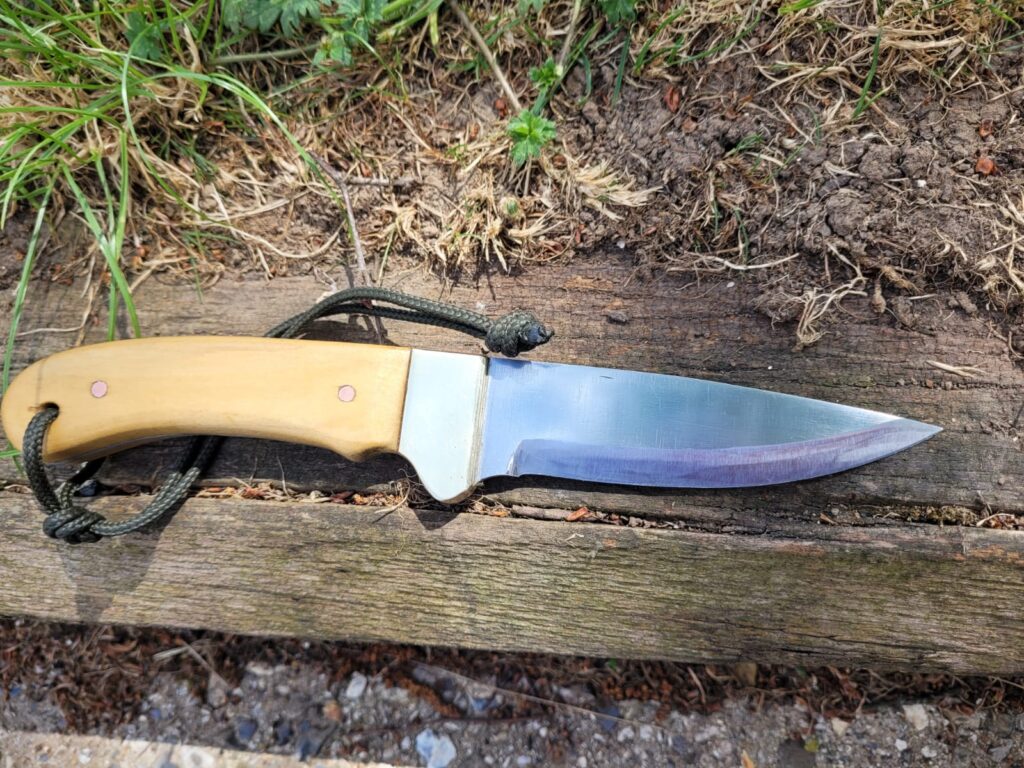 C. J. Unique Knives Light Wood